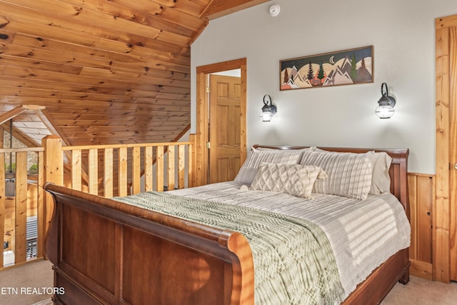 carpeted bedroom featuring lofted ceiling, wood ceiling, wood walls, and a wainscoted wall