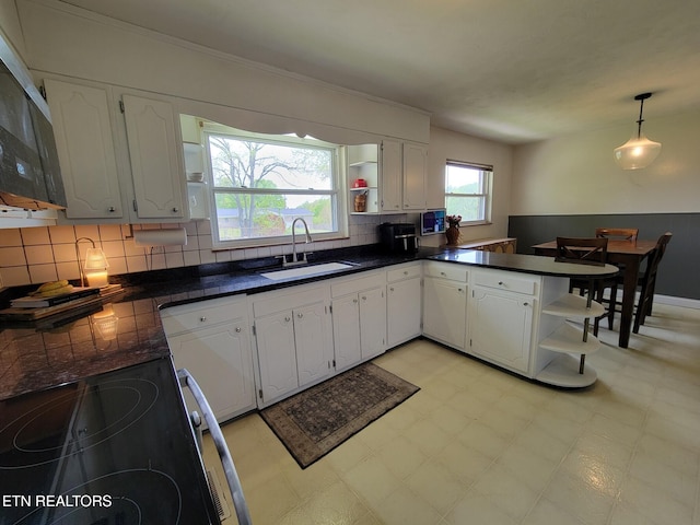 8008 Sharp Rd, Powell, TN 37849 - kitchen with a sink, open shelves, dark countertops, and electric stove