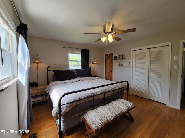 8008 Sharp Rd, Powell, TN 37849 - bedroom with a closet, visible vents, wood finished floors, and ceiling fan