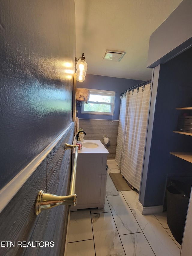 8008 Sharp Rd, Powell, TN 37849 - full bathroom with visible vents, marble finish floor, vanity, and a shower with shower curtain