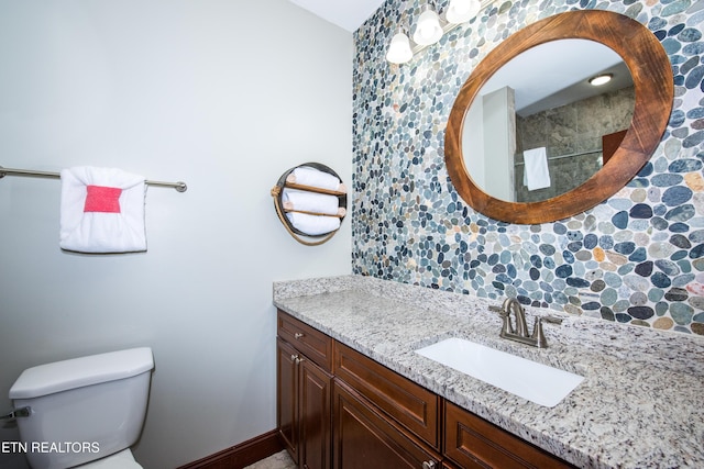 229 Bishops Cap Cir Unit 106, Townsend, TN 37882 - bathroom featuring vanity, toilet, and baseboards