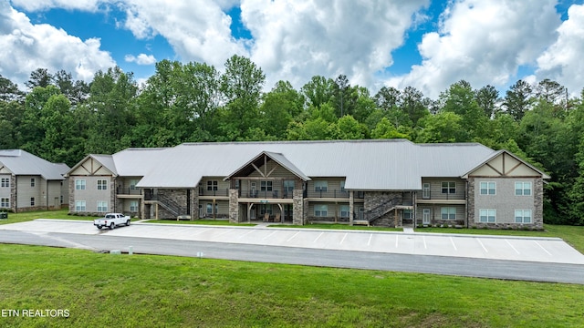 229 Bishops Cap Cir Unit 106, Townsend, TN 37882 - view of building exterior with uncovered parking