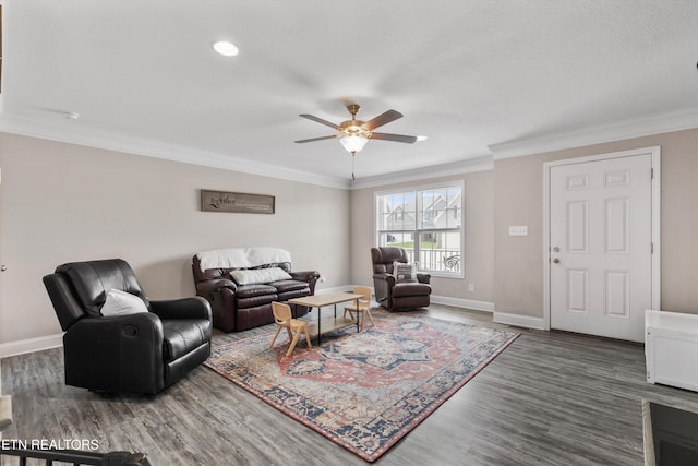 living area with a ceiling fan, baseboards, crown molding, wood finished floors, and recessed lighting