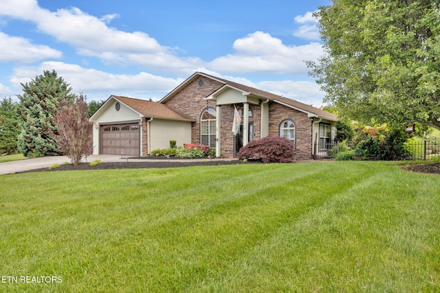791 Constitution Dr, Jefferson City, TN 37760 - view of front of home with stone siding, driveway, and an attached garage
