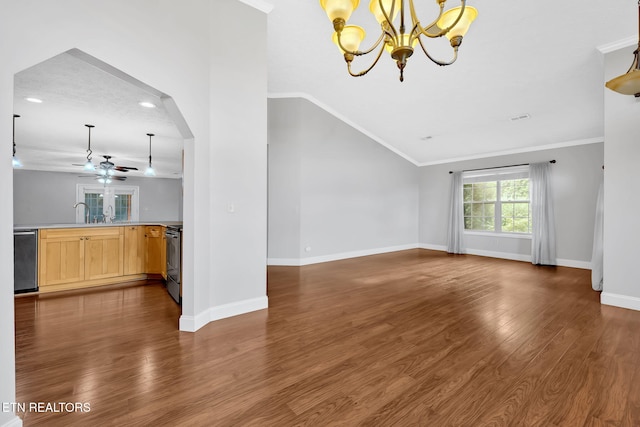 791 Constitution Dr, Jefferson City, TN 37760 - unfurnished living room with a chandelier, ceiling fan, vaulted ceiling, dark wood-type flooring, and baseboards