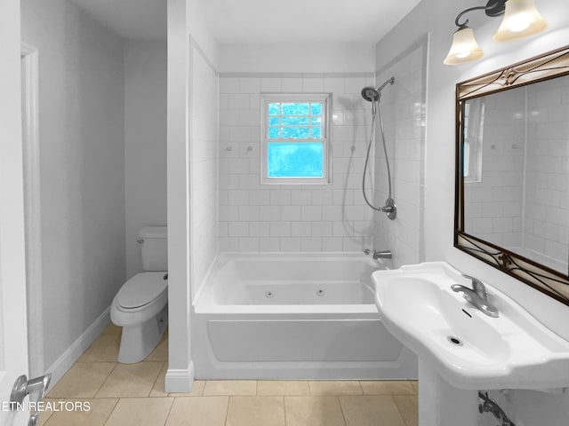 full bath with tile patterned floors, toilet, shower / bath combination, and a sink
