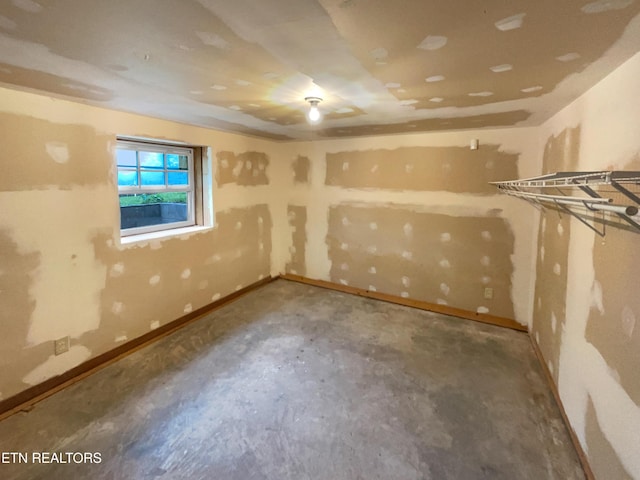 basement featuring baseboards