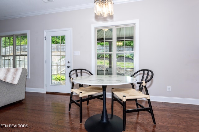 3336 Beaver Glade Ln, Knoxville, TN 37931 - dining room featuring crown molding, baseboards, dark wood-style flooring, and a chandelier