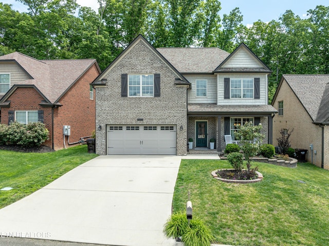 3336 Beaver Glade Ln, Knoxville, TN 37931 - craftsman house featuring a garage, driveway, and a front yard