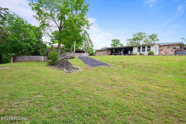 view of yard with fence