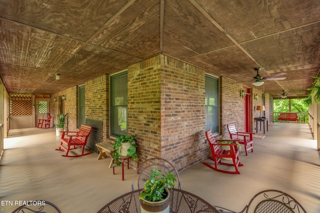 6605 Lammie Branch Ln, Knoxville, TN 37938 - covered porch featuring ceiling fan