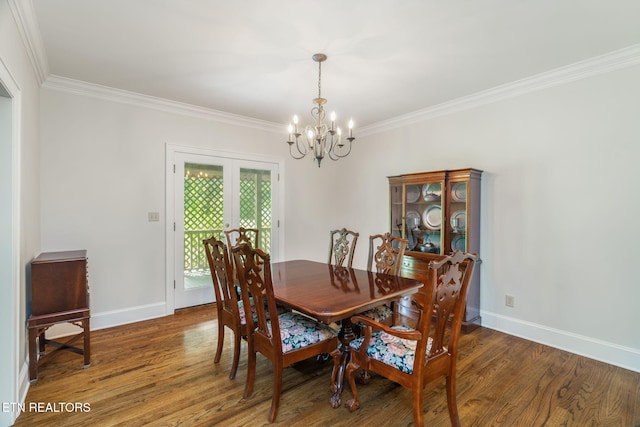 6605 Lammie Branch Ln, Knoxville, TN 37938 - dining room with a chandelier, ornamental molding, wood finished floors, and baseboards