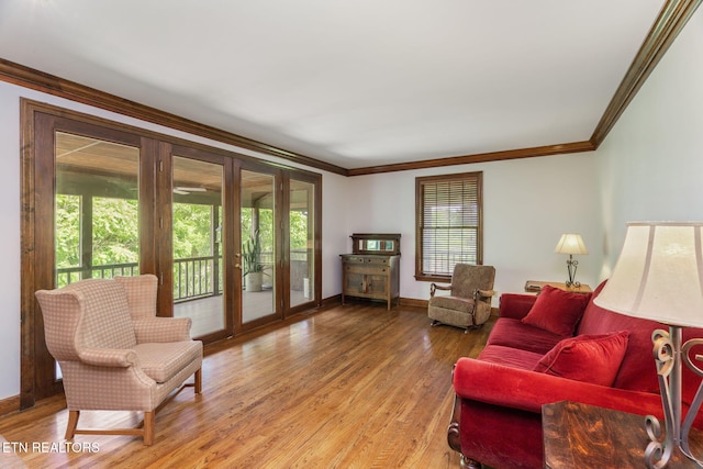 6605 Lammie Branch Ln, Knoxville, TN 37938 - living room with crown molding, light wood-style flooring, and baseboards