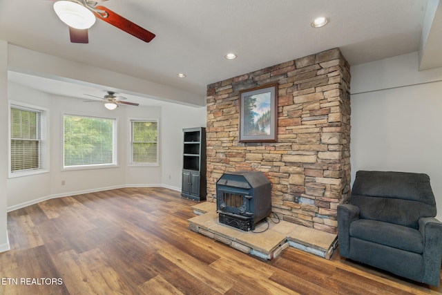6605 Lammie Branch Ln, Knoxville, TN 37938 - unfurnished living room featuring a wood stove, a ceiling fan, wood finished floors, baseboards, and recessed lighting