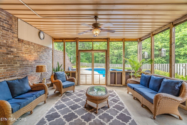 6605 Lammie Branch Ln, Knoxville, TN 37938 - sunroom / solarium featuring an outdoor hangout area and ceiling fan