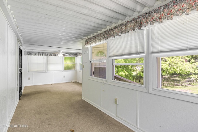 unfurnished sunroom featuring healthy amount of natural light