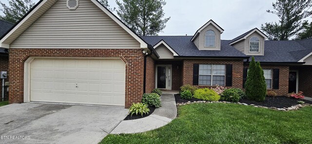 4808 Beverly Field Way, Knoxville, TN 37918 - cape cod-style house with brick siding, concrete driveway, an attached garage, and roof with shingles