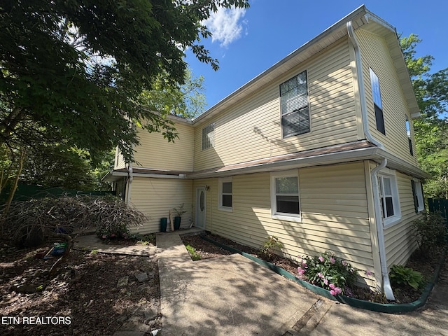 rear view of property with a patio area