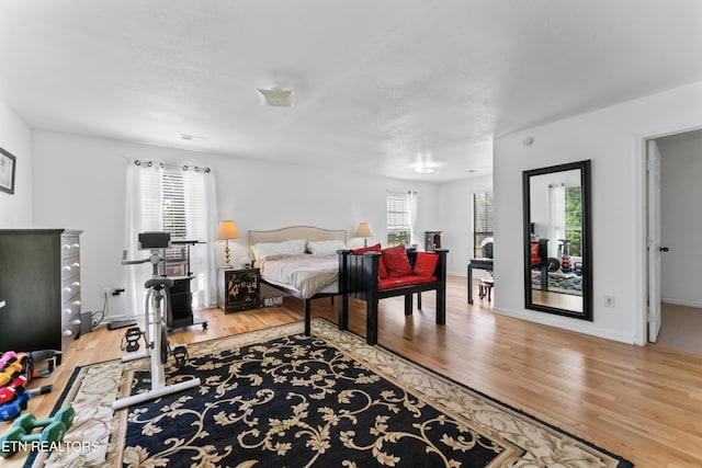 bedroom featuring wood finished floors