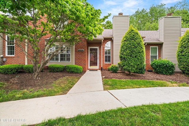5039 Griffins Gate Ln, Knoxville, TN 37912 - multi unit property featuring a chimney, brick siding, and a shingled roof