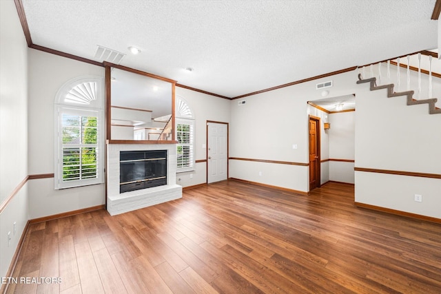 5039 Griffins Gate Ln, Knoxville, TN 37912 - unfurnished living room featuring crown molding and a textured ceiling