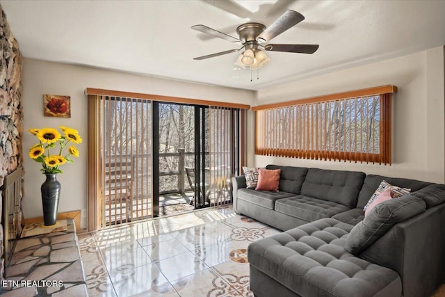 living room with a ceiling fan