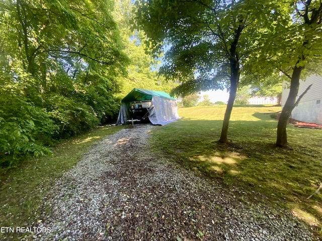205 Browder Rd, Kingston, TN 37763 - view of yard featuring a detached carport and driveway