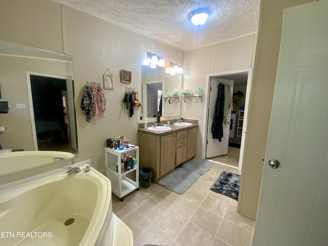 205 Browder Rd, Kingston, TN 37763 - full bath featuring a bath, a textured ceiling, tile patterned flooring, and vanity