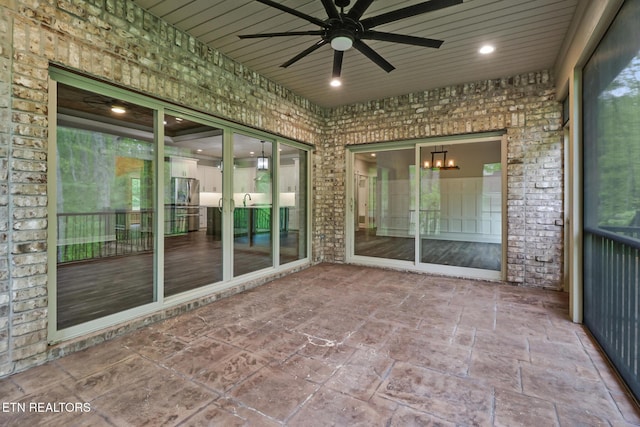 view of patio / terrace featuring ceiling fan