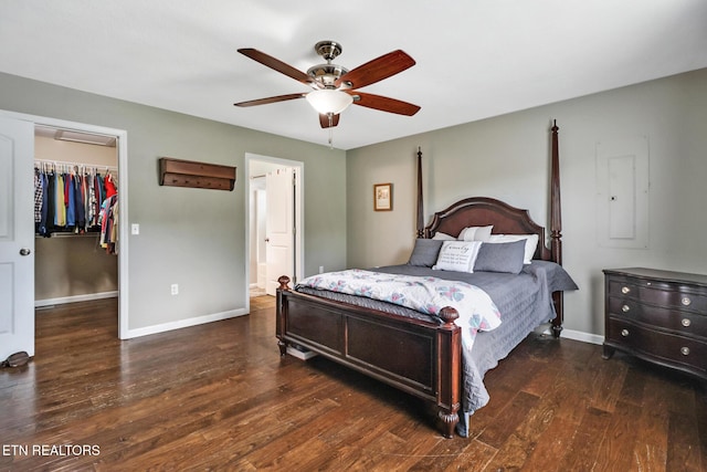 838 Buffalo Trl, Clarkrange, TN 38553 - bedroom featuring a walk in closet, wood finished floors, baseboards, and ceiling fan