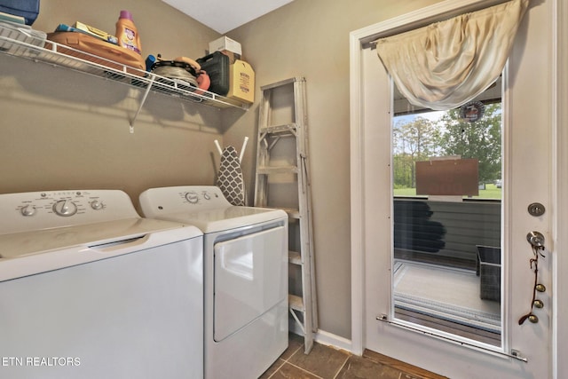 838 Buffalo Trl, Clarkrange, TN 38553 - clothes washing area featuring washer and clothes dryer, dark tile patterned floors, and baseboards