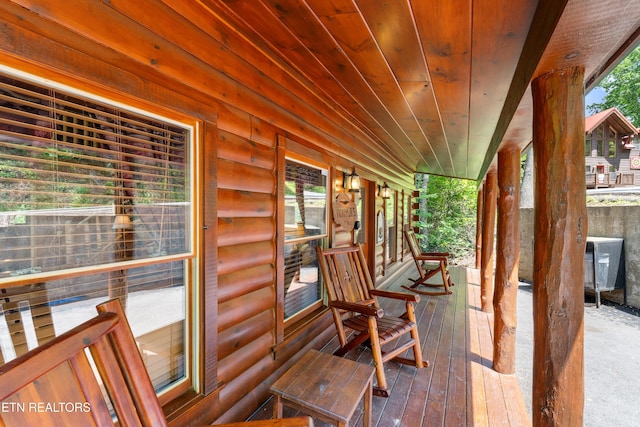 unfurnished sunroom featuring healthy amount of natural light