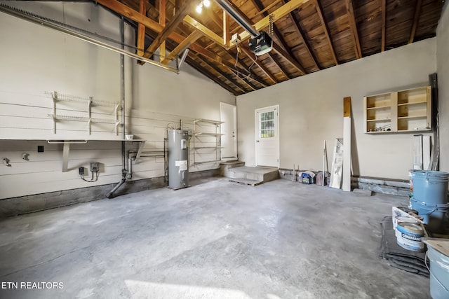 908 Glenoaks Dr, Knoxville, TN 37918 - garage with electric water heater and a garage door opener