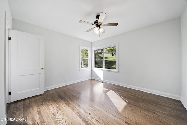 908 Glenoaks Dr, Knoxville, TN 37918 - empty room featuring ceiling fan, wood finished floors, and baseboards