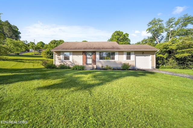 908 Glenoaks Dr, Knoxville, TN 37918 - view of front of home with a garage, asphalt driveway, and a front lawn