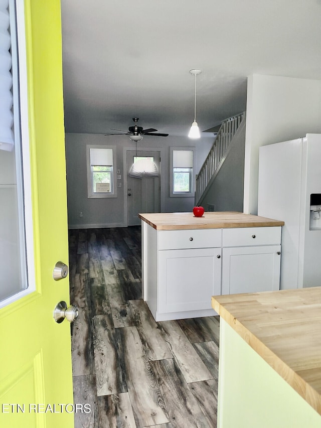 2232 Mississippi Ave, Knoxville, TN 37921 - kitchen with butcher block countertops, white refrigerator with ice dispenser, dark wood finished floors, and white cabinets