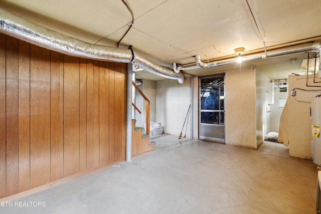 3606 Sevier Heights Rd, Knoxville, TN 37920 - below grade area with stairs, wooden walls, and electric water heater
