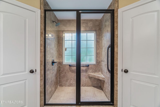 full bathroom with a stall shower