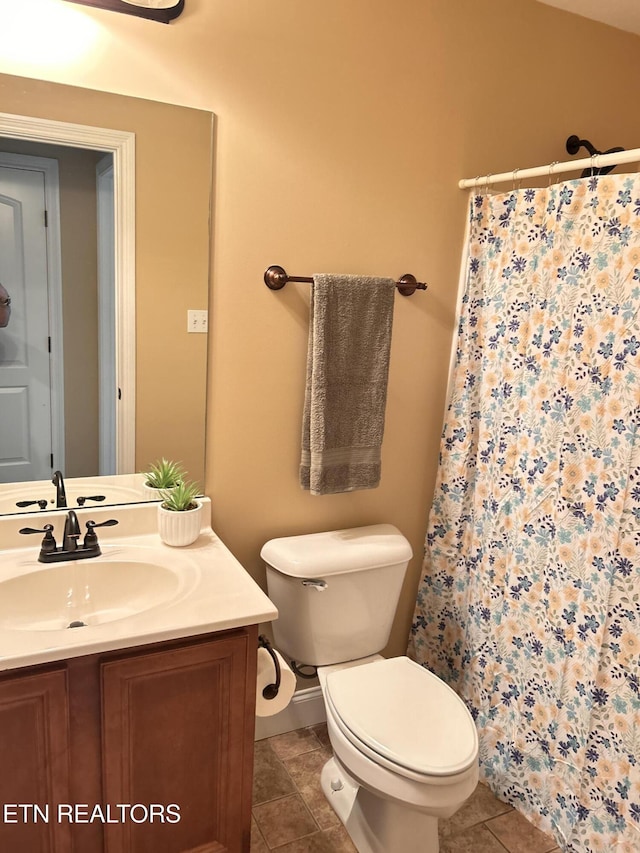 326 Joshua Landing Ct, Seymour, TN 37865 - bathroom featuring vanity, toilet, tile patterned floors, and a shower with shower curtain