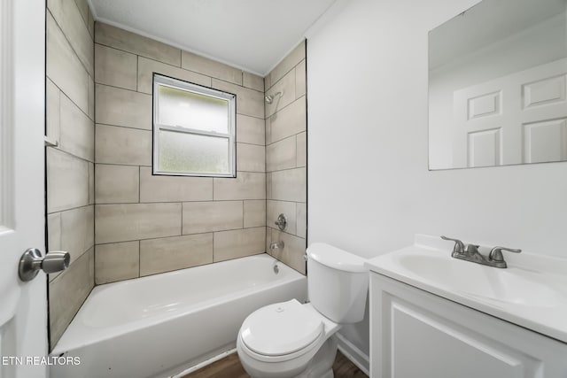 full bath featuring toilet, shower / bathtub combination, vanity, and wood finished floors