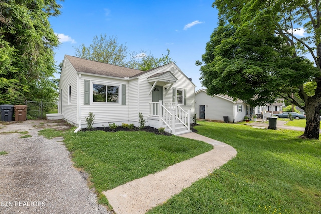 3219 Sunset Ave, Knoxville, TN 37914 - view of front of home with a shingled roof and a front lawn