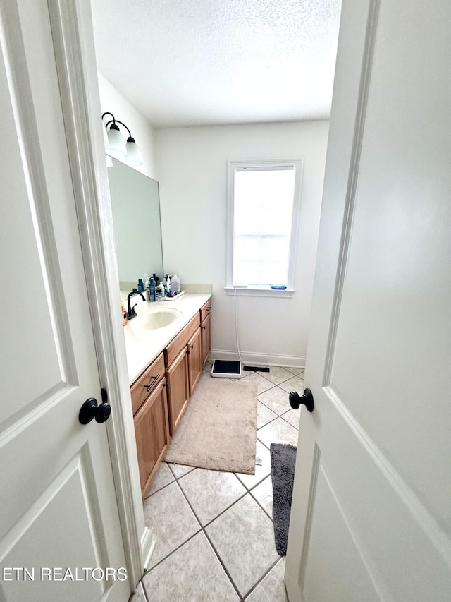 208 Cornerstone Cir, Clinton, TN 37716 - bathroom featuring vanity, tile patterned flooring, and a textured ceiling