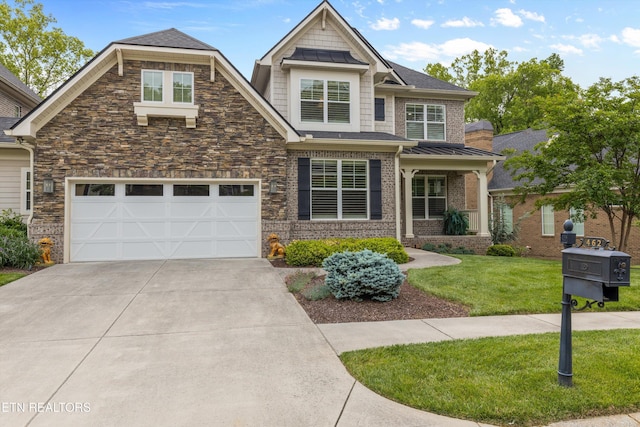 462 Chapel Grove Ln, Knoxville, TN 37934 - craftsman house with concrete driveway, a front lawn, roof with shingles, a garage, and stone siding
