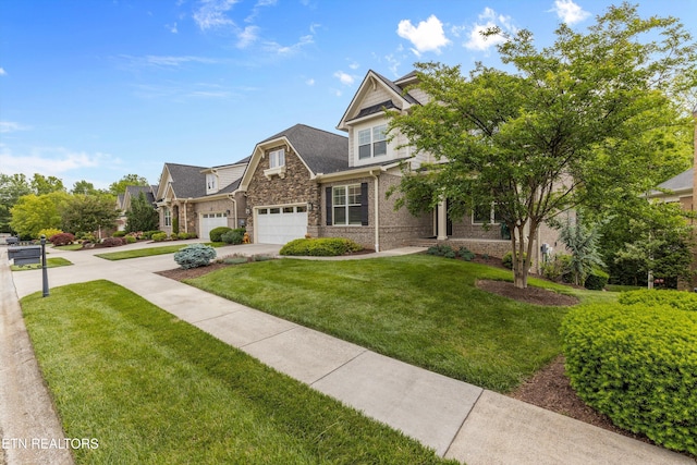 462 Chapel Grove Ln, Knoxville, TN 37934 - view of front of home with driveway, stone siding, a front yard, and a garage