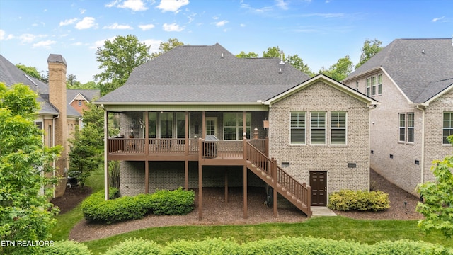 462 Chapel Grove Ln, Knoxville, TN 37934 - rear view of house featuring stairs, brick siding, a sunroom, a wooden deck, and a lawn