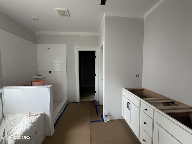 bathroom featuring walk in shower