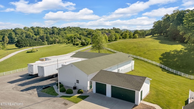 1182 Murrell Rd, Morristown, TN 37814 - aerial view of property and surrounding area with a heavily wooded area