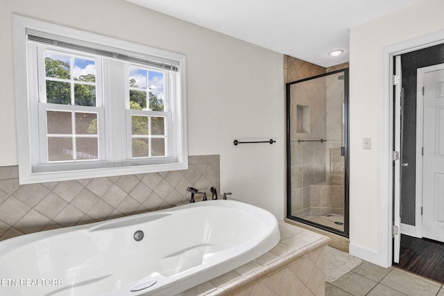 1182 Murrell Rd, Morristown, TN 37814 - bathroom with a shower stall, a garden tub, and tile patterned flooring