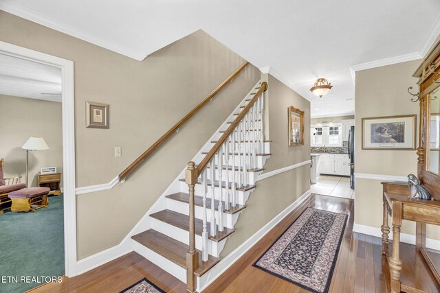 1182 Murrell Rd, Morristown, TN 37814 - stairway with wood finished floors, ornamental molding, and baseboards