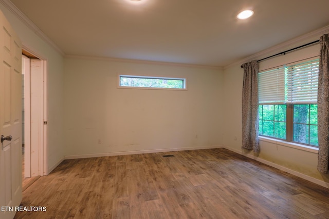 915 Yellow Breeches Rd, Cosby, TN 37722 - empty room featuring ornamental molding, light wood finished floors, baseboards, and recessed lighting